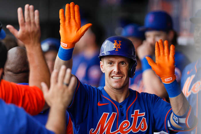 Mar 24, 2022; Port St. Lucie, Florida, USA; New York Mets right fielder Mark Canha (19) celebrates with teammates after hitting a home run in the first inning against the Miami Marlins during spring training at Clover Park. Mandatory Credit: Sam Navarro-USA TODAY Sports